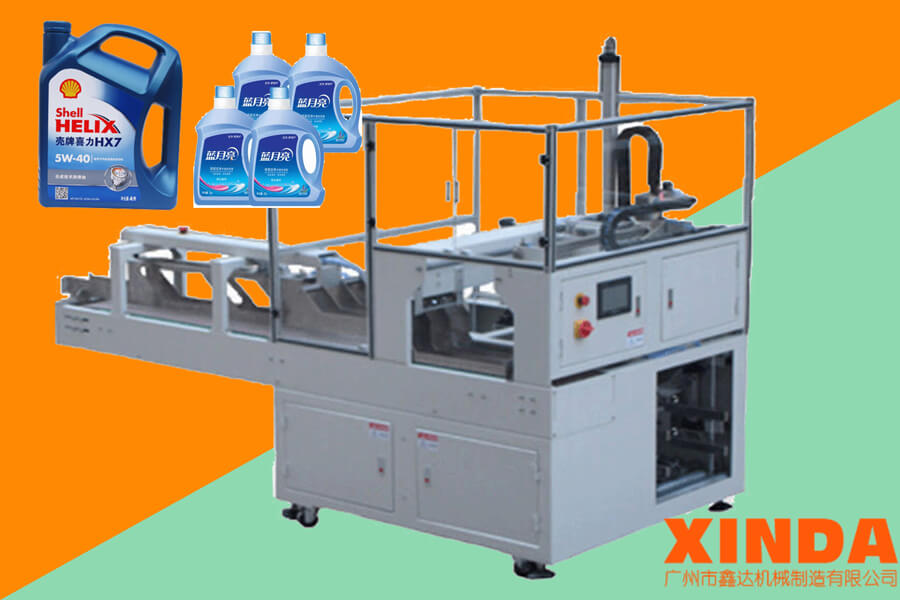 洗衣液定制型裝箱機_桶裝潤滑油裝箱機(跌落式)-廣州鑫達機械